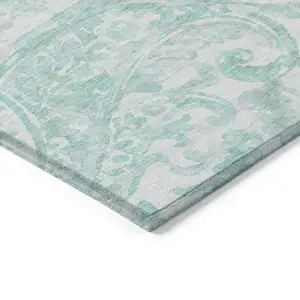 Photo of Turquoise And Ivory Paisley Washable Indoor Outdoor Area Rug