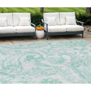 Photo of Turquoise And Ivory Paisley Washable Indoor Outdoor Area Rug