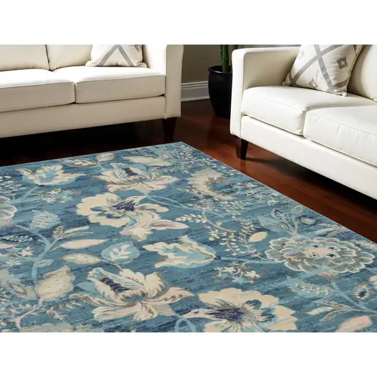 Turquoise Cream and Navy Blue Floral Distressed Area Rug Photo 1