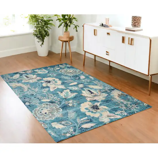 Turquoise Cream and Navy Blue Floral Distressed Area Rug Photo 1