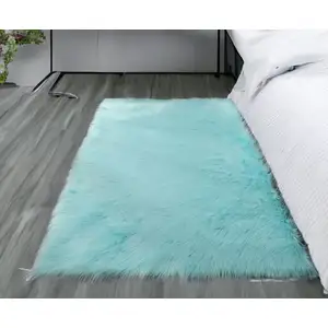 Photo of Turquoise Sheepskin Washable Area Rug With Fringe