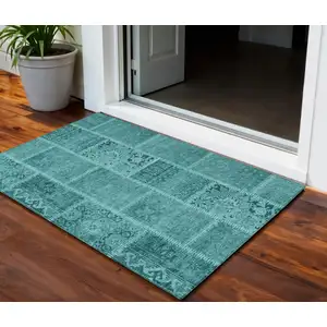 Photo of Turquoise Teal Blue And Aqua Patchwork Washable Indoor Outdoor Area Rug