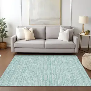 Photo of Turquoise Teal Blue And Gray Striped Washable Indoor Outdoor Area Rug