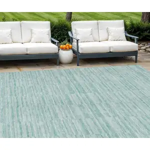 Photo of Turquoise Teal Blue And Gray Striped Washable Indoor Outdoor Area Rug