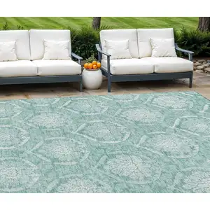 Photo of Turquoise Teal Blue And Ivory Medallion Washable Indoor Outdoor Area Rug