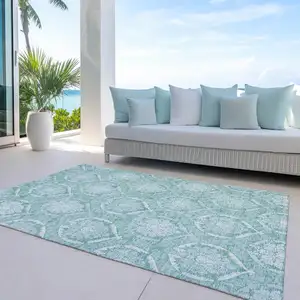 Photo of Turquoise Teal Blue And Ivory Medallion Washable Indoor Outdoor Area Rug