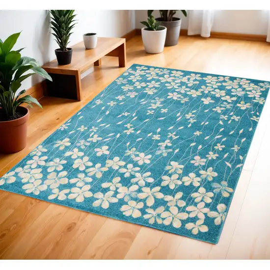 Turquoise and Cream Botanical Leaves Area Rug Photo 1