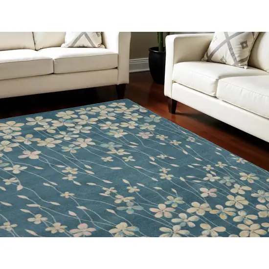 Turquoise and Cream Floral Area Rug Photo 1