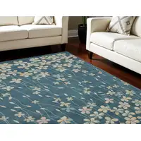 Photo of Turquoise and Cream Floral Area Rug