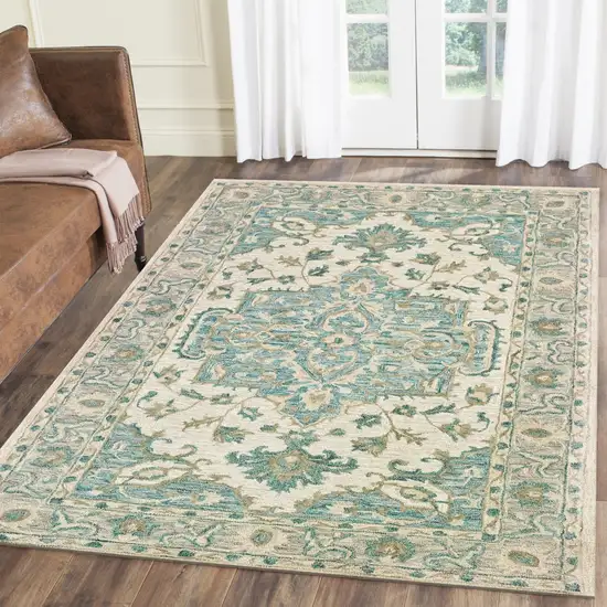 Turquoise and Cream Medallion Area Rug Photo 8