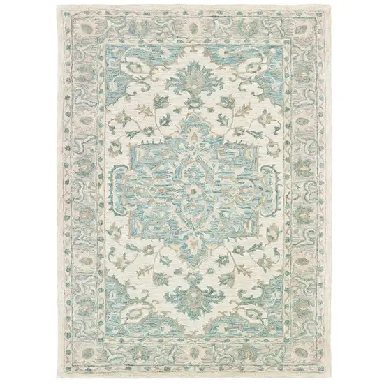 Turquoise and Cream Medallion Area Rug Photo 1