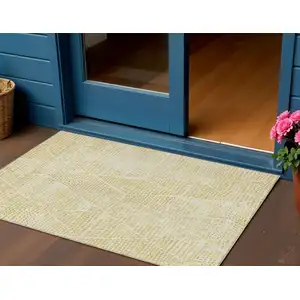 Photo of Wheat Gold And Ivory Geometric Washable Indoor Outdoor Area Rug