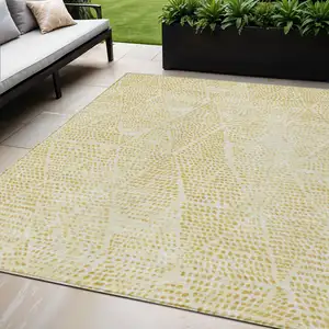 Photo of Wheat Gold And Ivory Geometric Washable Indoor Outdoor Area Rug