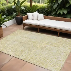 Photo of Wheat Gold And Ivory Geometric Washable Indoor Outdoor Area Rug