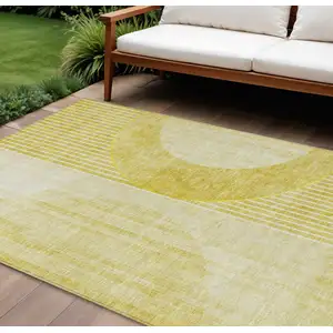 Photo of Wheat Gold And Ivory Geometric Washable Indoor Outdoor Area Rug