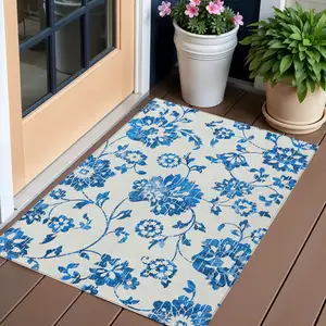 Photo of White And Denim Blue Floral Washable Indoor Outdoor Area Rug