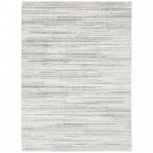 Photo of White And Grey Abstract Power Loom Stain Resistant Area Rug