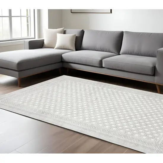 Gray and White Oriental Power Loom Area Rug Photo 1