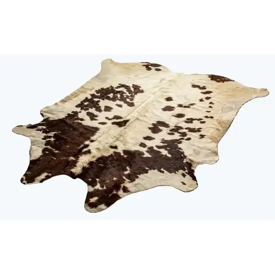 Brown and White Cowhide Handmade Area Rug Photo 1