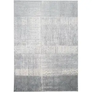 Photo of White Gray And Blue Abstract Area Rug