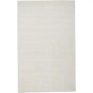 Photo of White Hand Woven Distressed Area Rug