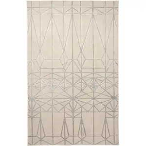 Photo of White Silver And Gray Geometric Stain Resistant Area Rug