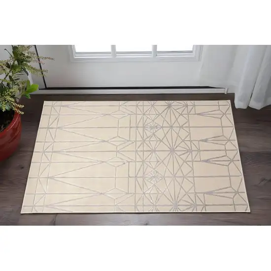 White Silver And Gray Geometric Stain Resistant Area Rug Photo 1