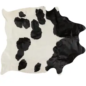 Photo of White and Black Cowhide  Rug