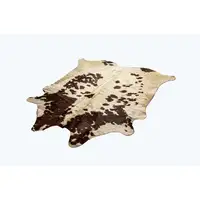 Photo of White and Brown Cowhide  Rug