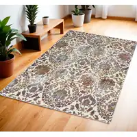 Photo of White and Golden Brown Floral Distressed Non Skid Area Rug