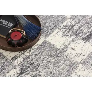 Photo of White and Gray Checkered Area Rug