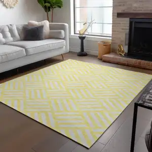 Photo of Yellow And Ivory Geometric Washable Indoor Outdoor Area Rug