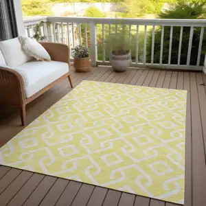 Photo of Yellow And Ivory Geometric Washable Indoor Outdoor Area Rug