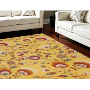 Photo of Yellow Floral Power Loom Area Rug