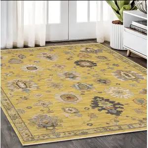 Photo of Yellow Gray And Black Oriental Area Rug With Fringe