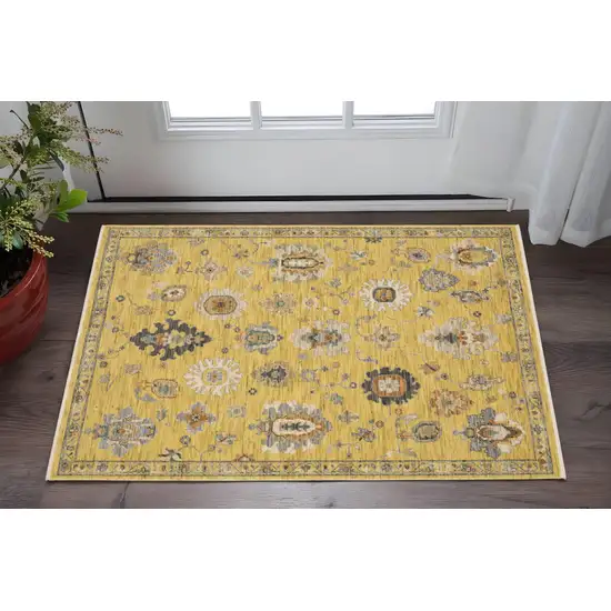 Yellow Ivory And Black Oriental Area Rug With Fringe Photo 1