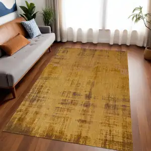 Photo of Yellow and Brown Abstract Non Skid Area Rug