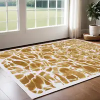 Photo of Yellow and Brown Abstract Non Skid Area Rug