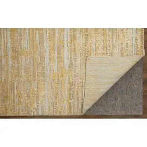 Photo of Yellow and Ivory Abstract Hand Woven Area Rug