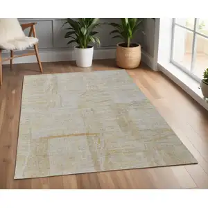 Photo of Yellow and Ivory Abstract Hand Woven Area Rug