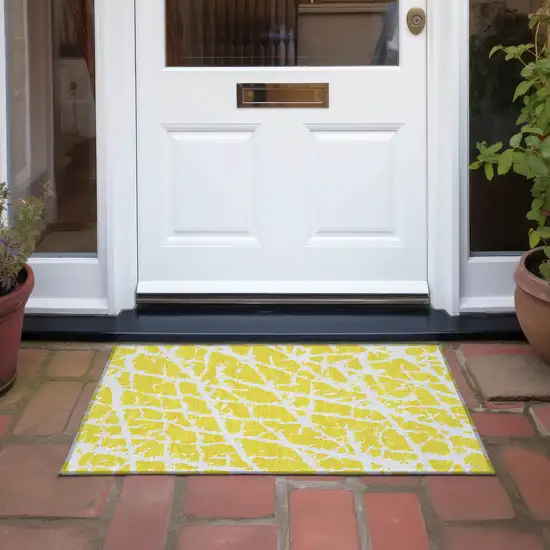 Yellow and White Abstract Washable Non Skid Indoor Outdoor Area Rug Photo 9