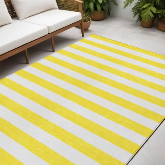 Yellow and White Striped Washable Indoor Outdoor Area Rug Photo 1