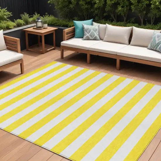 Yellow and White Striped Washable Indoor Outdoor Area Rug Photo 1