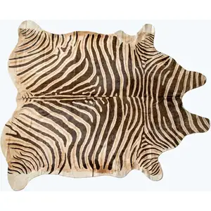 Photo of Zebra Chocolate And Natural Cowhide Handmade Area Rug