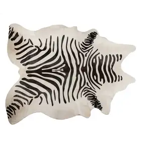 Photo of Zebra Stripe Black and White Natural Cowhide Area Rug